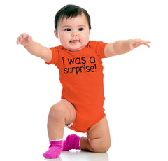 I Was A Surprise Romper Bodysuit-Direct To Garment Print-Brisco Baby