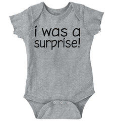 I Was A Surprise Romper Bodysuit-Direct To Garment Print-Brisco Baby
