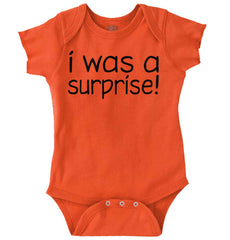 I Was A Surprise Romper Bodysuit-Direct To Garment Print-Brisco Baby